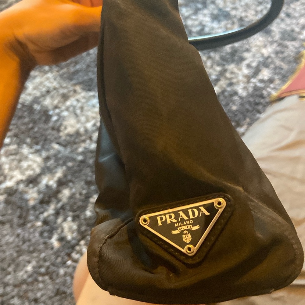Authentic Prada hand bag, broken handle . Price firm